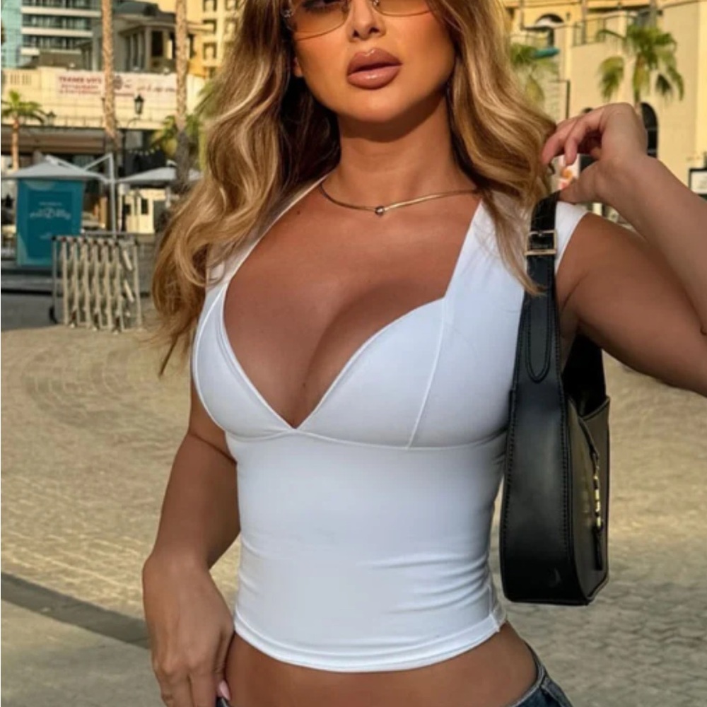 Fashion Nova 
Salty, sweet plunge neck top